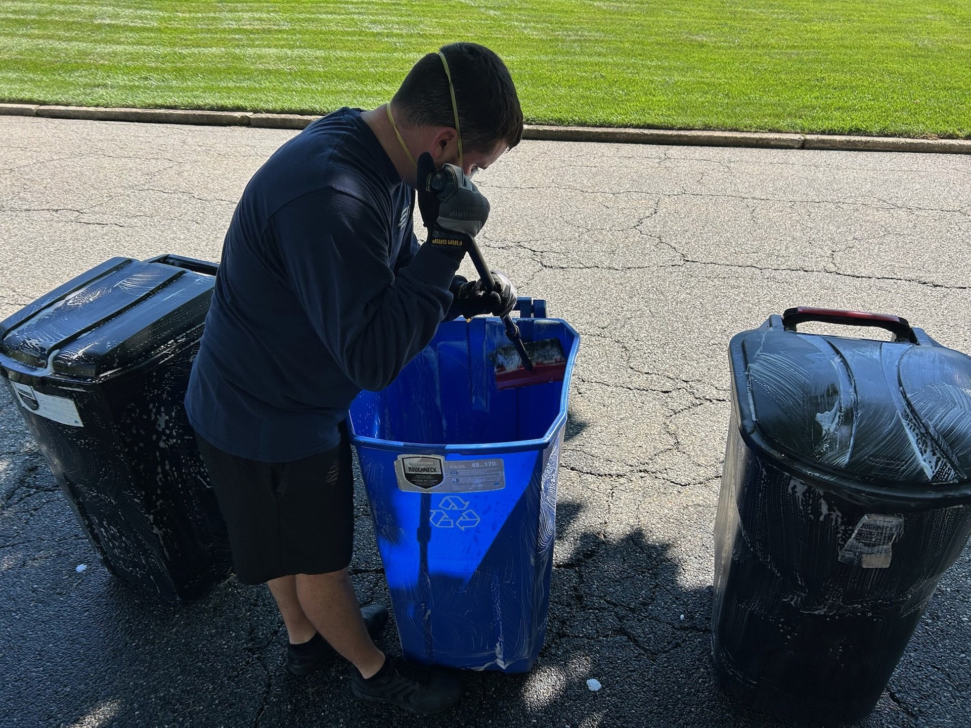 Hand-scrubbing a can with degreaser