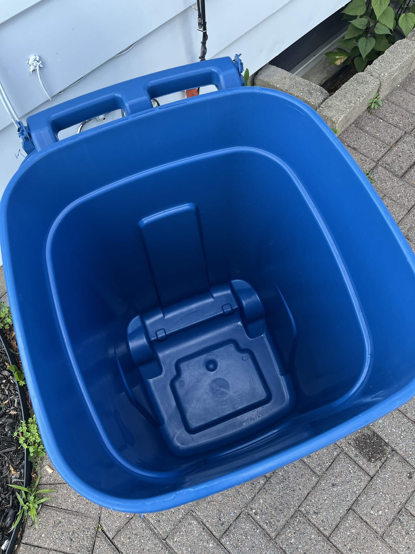 Rows of finished, spotless trash cans
